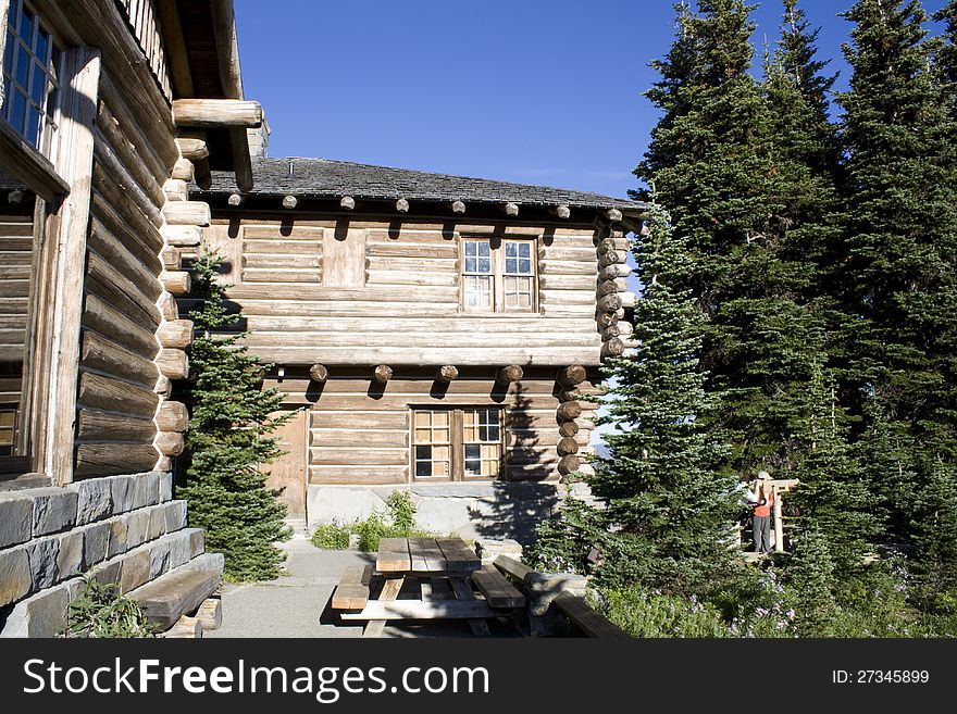 A wooden cabin on a mountain