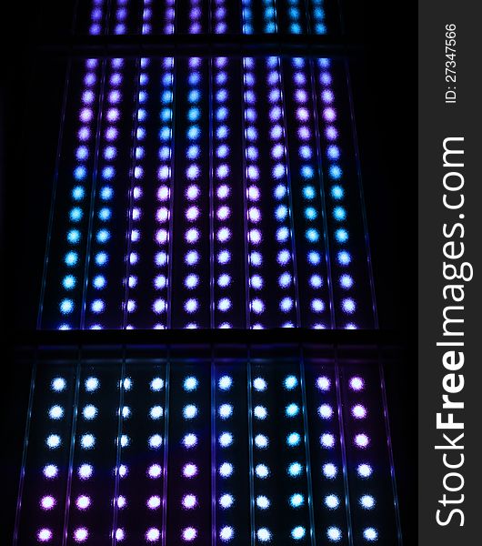 Colorful light spots display matrix background black. Colorful light spots display matrix background black