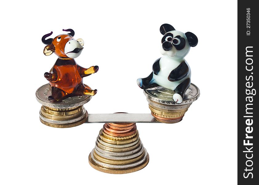 Bull And Bear Balancing With Coins