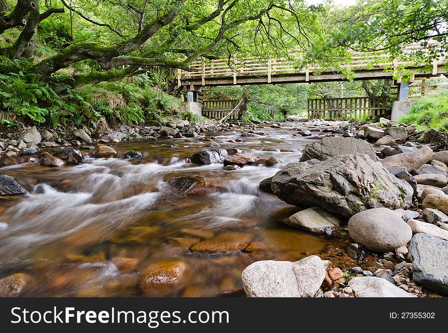 Rocky woodland stream in the hills. Rocky woodland stream in the hills