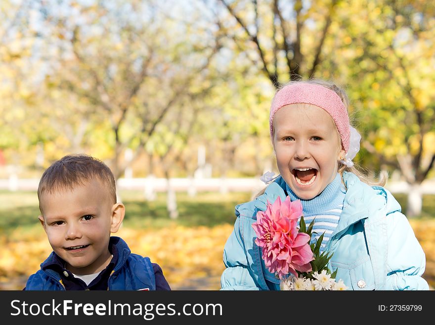 Happy Children Picking Flowers