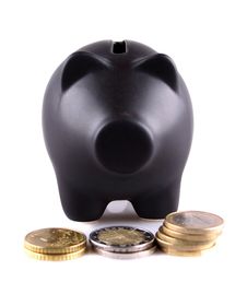 Black Piggy Bank With Euro Coins Royalty Free Stock Photo