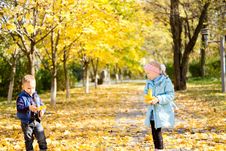Children In A Colourful Autumn Park Royalty Free Stock Photography Children In A Colourful Autumn Park Royalty Free Stock Photography