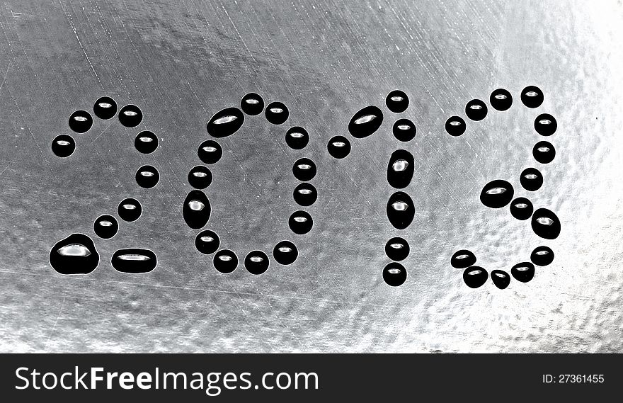 New year 2013. Abstract background of water drops on a black background