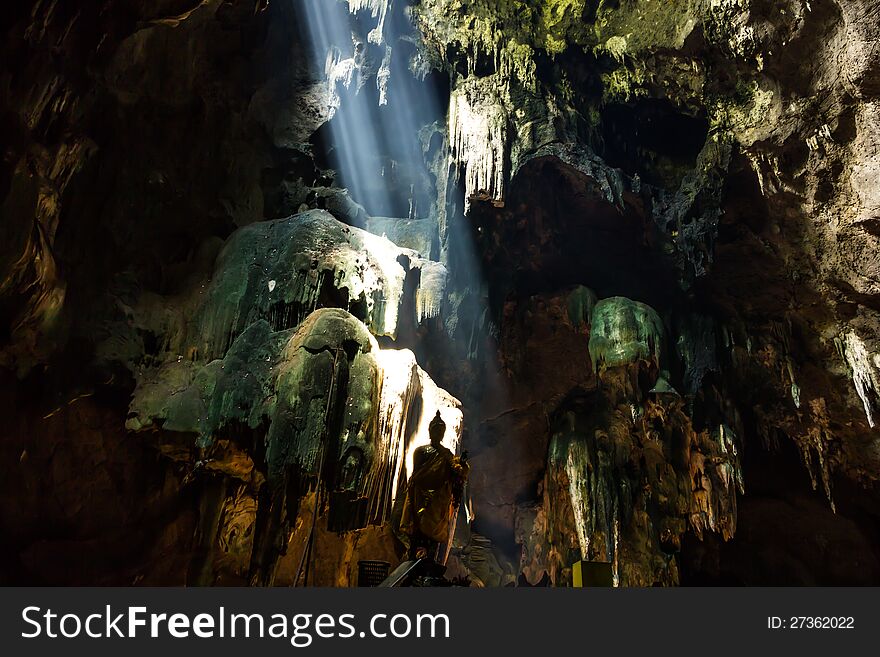 Buddha statue in cavern at Ratchaburi.