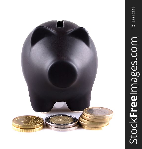 Black piggy bank with euro coins on white background
