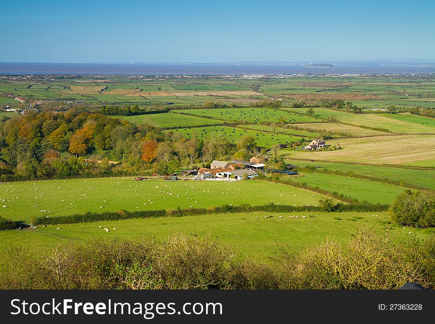 Brent Knoll hill on the Somerset Levels in Somerset, England. It is located half way between Weston-super-Mare and Bridgwater with views of Bristol Channel coast and inland to Crook Peak and Glastonbury Tor. Very popular with walkers and has public footpaths to the top. At the foot of the hill are two villages East Brent and Brent Knoll. The hill dominates the landscape and can be seen for many miles. Brent Knoll hill on the Somerset Levels in Somerset, England. It is located half way between Weston-super-Mare and Bridgwater with views of Bristol Channel coast and inland to Crook Peak and Glastonbury Tor. Very popular with walkers and has public footpaths to the top. At the foot of the hill are two villages East Brent and Brent Knoll. The hill dominates the landscape and can be seen for many miles.