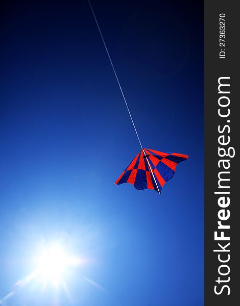 Kite on blue sky