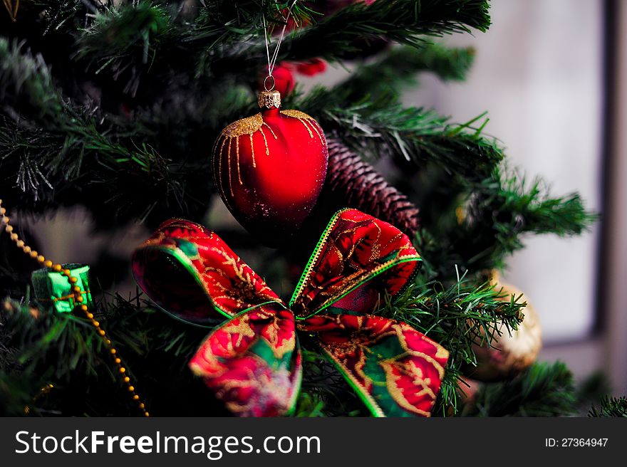 Christmas tree decorated with different beautiful toys. Christmas tree decorated with different beautiful toys