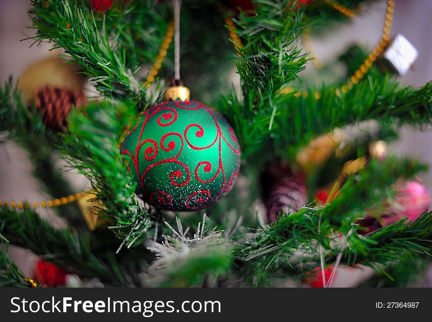 Christmas tree decorated with different beautiful toys. Christmas tree decorated with different beautiful toys