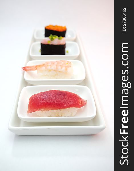 Sushi is Japanese food consisting of cooked vinegared rice combined with other ingredients  usually raw fish or other seafood. Sushi is Japanese food consisting of cooked vinegared rice combined with other ingredients  usually raw fish or other seafood.