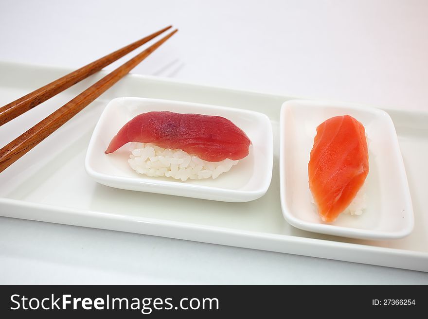 Sushi is Japanese food consisting of cooked vinegared rice combined with other ingredients  usually raw fish or other seafood. Sushi is Japanese food consisting of cooked vinegared rice combined with other ingredients  usually raw fish or other seafood.