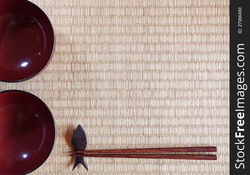 Chopsticks ans two bowls in asian set table. Chopsticks ans two bowls in asian set table