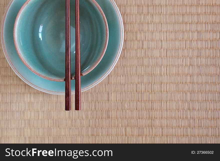 Chopsticks with bowl in asian set table. Chopsticks with bowl in asian set table