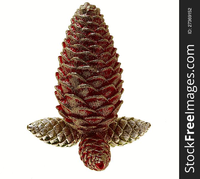 Christmas decoration as a figure from artificial cones of coniferous trees. Scales of cones painted red and gold colors. Christmas decoration as a figure from artificial cones of coniferous trees. Scales of cones painted red and gold colors.