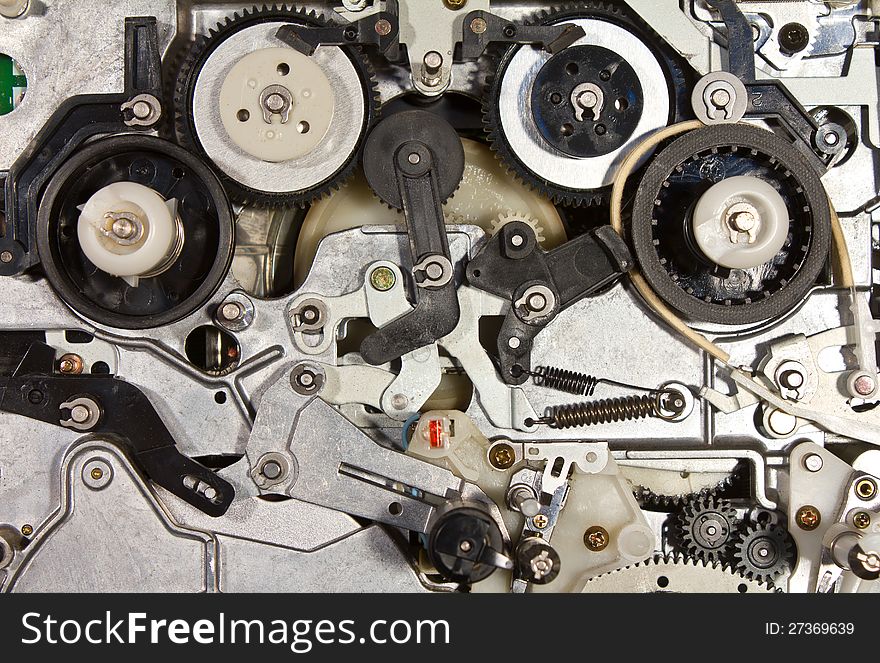 Internal mechanism of old VHS player that does not work then. Internal mechanism of old VHS player that does not work then.