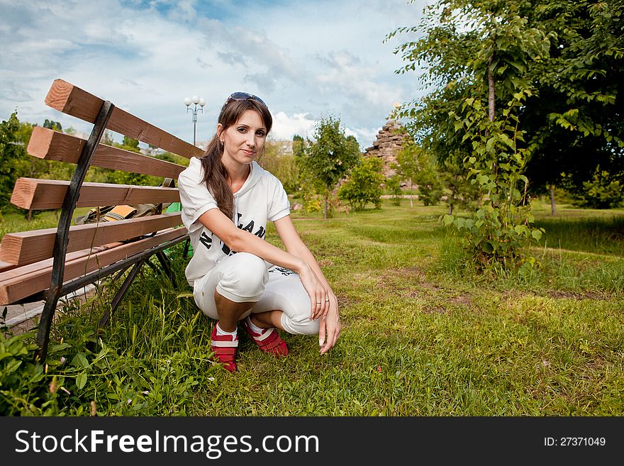 Beautiful woman portrait to the nature in black sunglasses. Beautiful woman portrait to the nature in black sunglasses