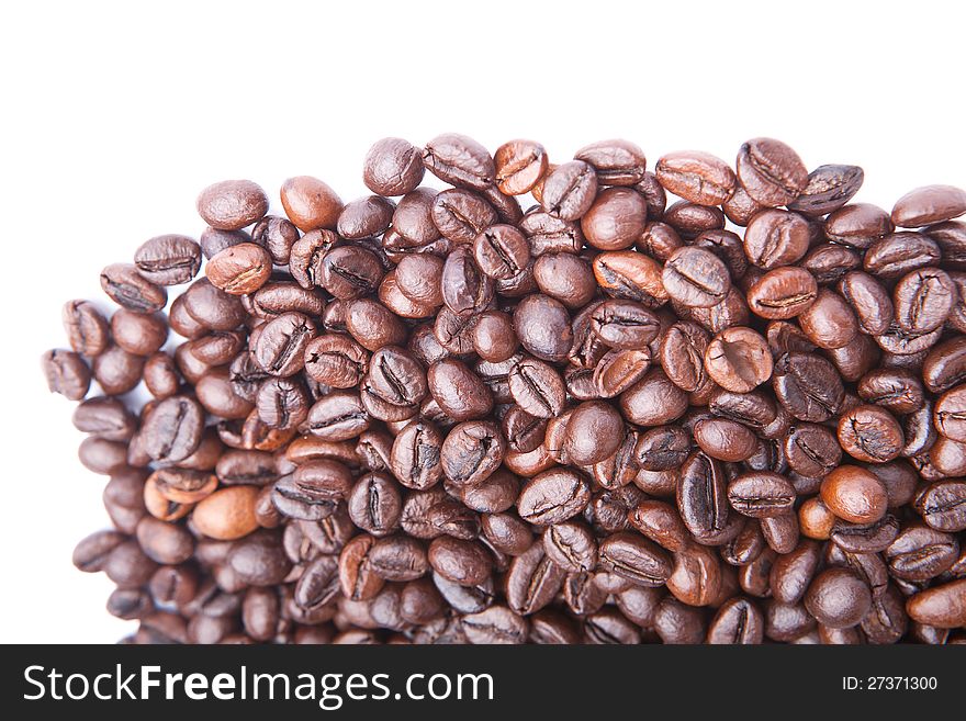 Heap Of Coffee Beans.  On White