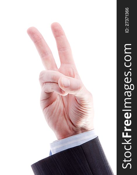 Hand with two fingers up in the peace or victory symbol isolated on white background