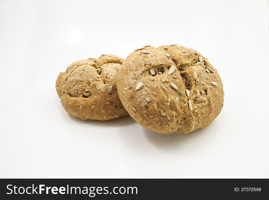 Seeded Italian bread in white background. Seeded Italian bread in white background