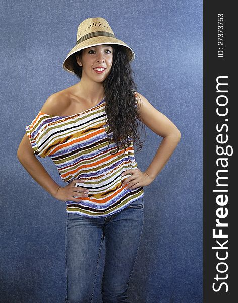 Beautiful latin young woman with shirt colors and hat. Beautiful latin young woman with shirt colors and hat