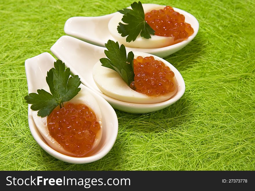 Easter eggs with red caviar. Easter eggs with red caviar