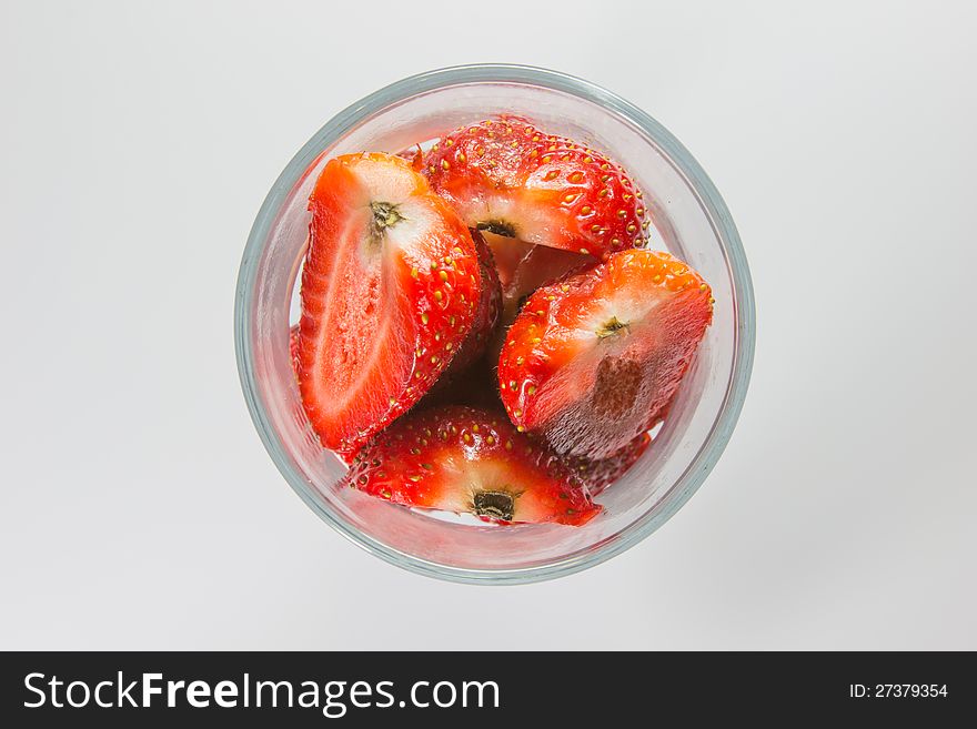 Strawberry slices in glass top view