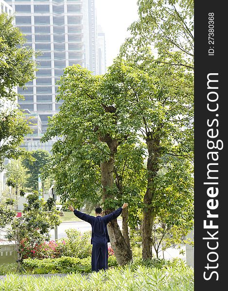 A man doing excercise outdoor. A man doing excercise outdoor.