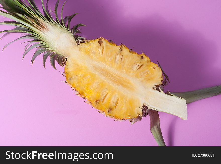 Fresh Pineapple on pink background