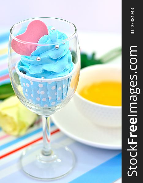 of Blue cup cake in wine glass