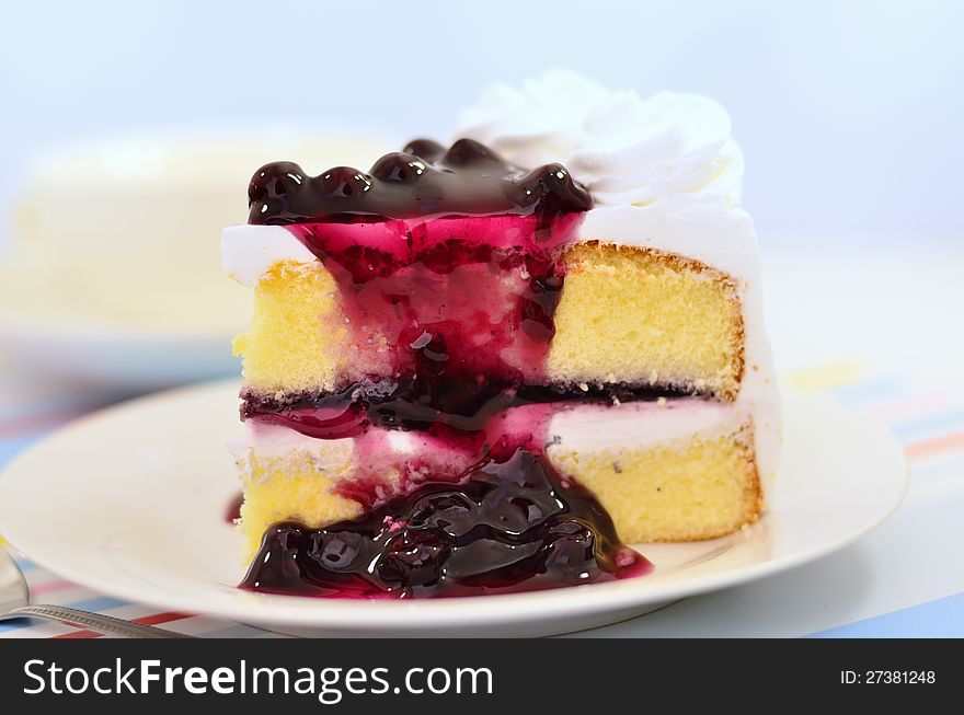 Blueberry cake set for coffee break on white dish