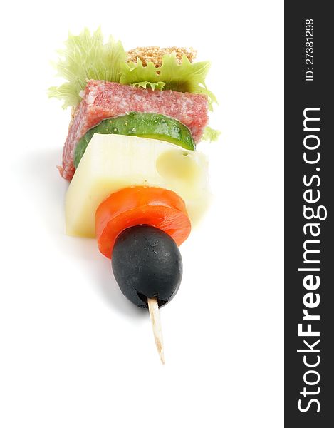 Single Canape with Lettuce, Salami, Tomatoes, Cheese, Cucumber,Black Olive, and Whole Grain Bread  on white background