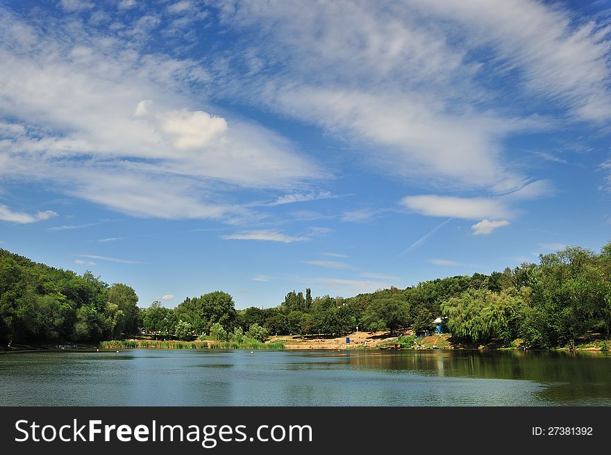 Sky under  lake, city park. Sky under  lake, city park