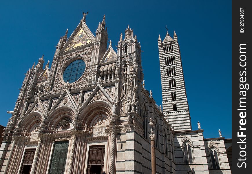 The facade of the Cathedral in Siena. The facade of the Cathedral in Siena