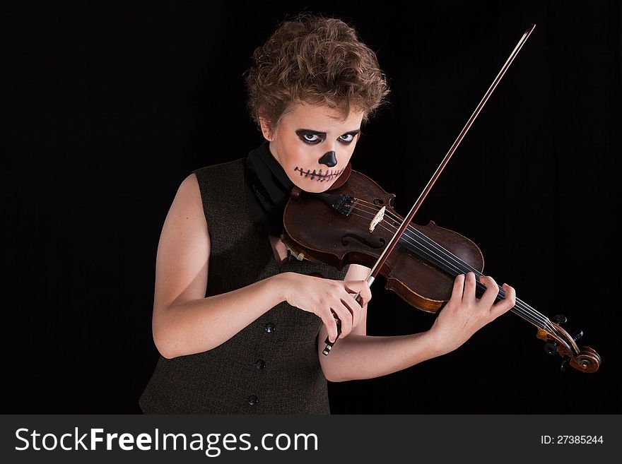 Boy ,halloween face art with fog on black background