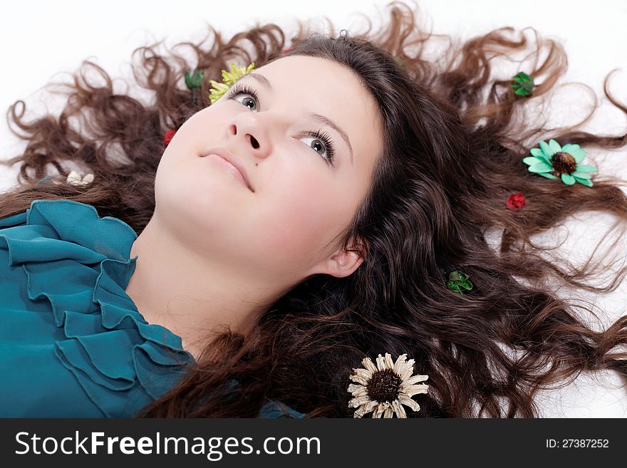 Portrait Of Pretty Brunette Girl With Flowers