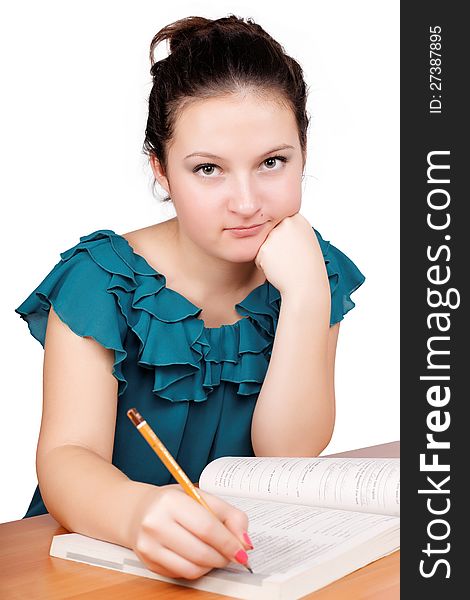 Pretty girl writes a white background isolated