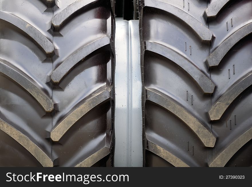 A close-up of new large tractor tire. A close-up of new large tractor tire