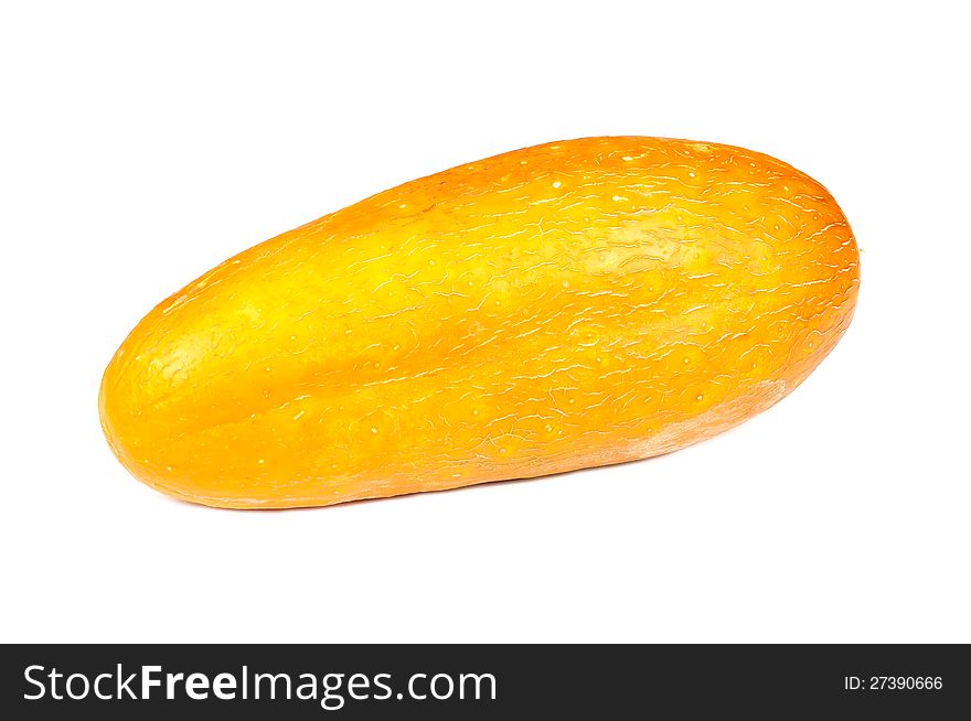 A large overripe yellow cucumber on white background