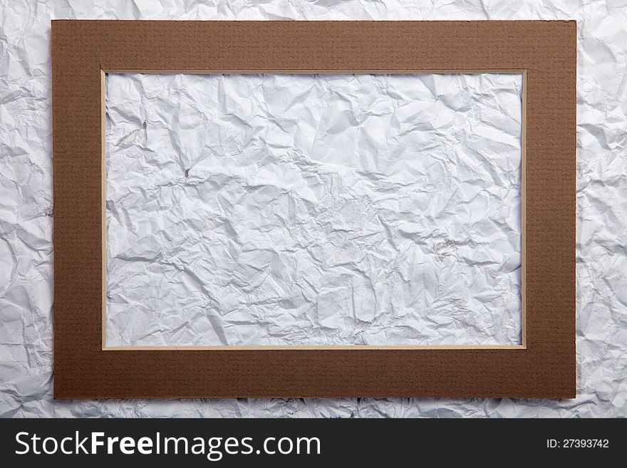 Old crumpled paper texture with frame top. Old crumpled paper texture with frame top