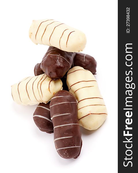 Heap of Eclairs with Dark and White Chocolate Glaze  on white background