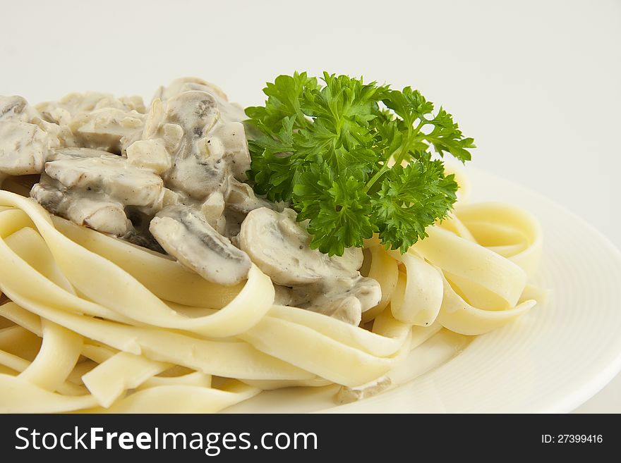 Italian pasta linguini with mushrooms and creram sauce. Italian pasta linguini with mushrooms and creram sauce