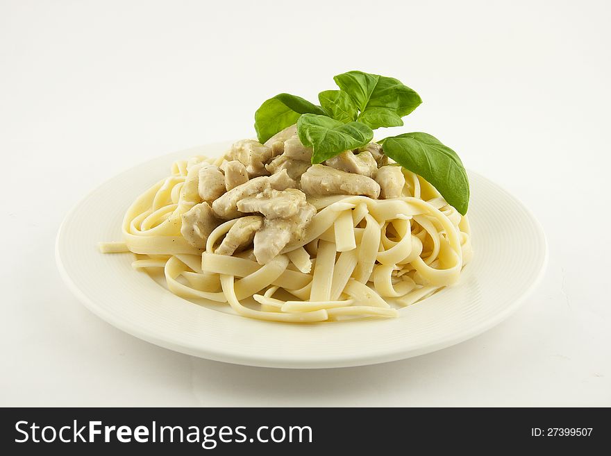 Italian pasta linguini with chicken and cream sauce. Italian pasta linguini with chicken and cream sauce