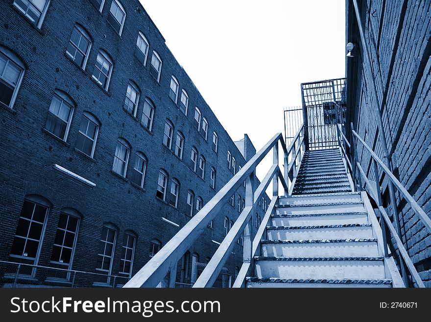 Metal stairway going up in an old downtown building, Los Angeles, California, USA.