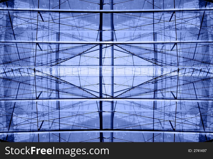 Abstract  background - overlapping reflections in the windows of a modern conference hall. Blue monochrome. Abstract  background - overlapping reflections in the windows of a modern conference hall. Blue monochrome