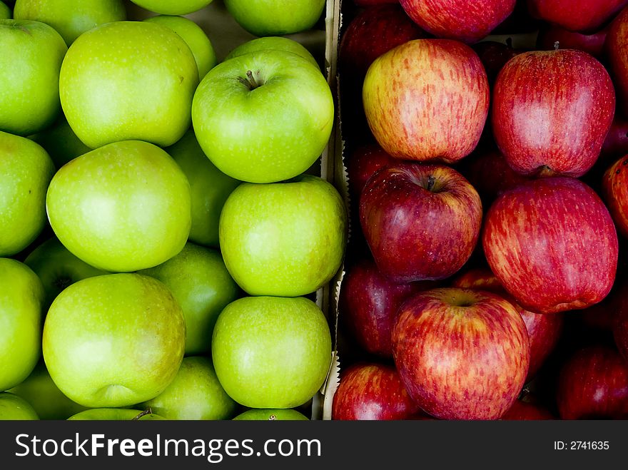 Photo from above of two group of green and red apple. Photo from above of two group of green and red apple.