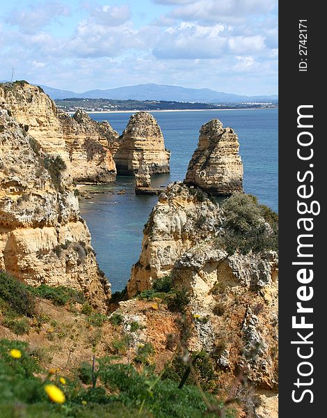 Blue sea with rocky coastline