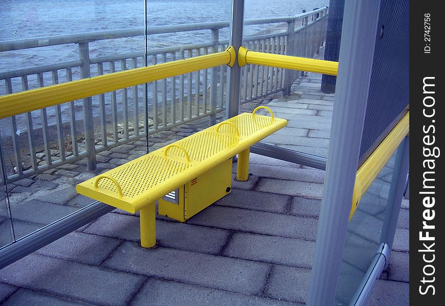 A bus stop seat seat. A bus stop seat seat