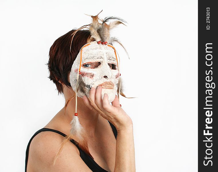 Girl with a papier mache mask. Girl with a papier mache mask