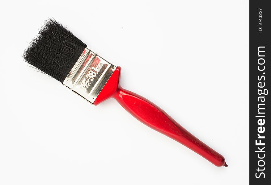 One brush on a white surface. One brush on a white surface